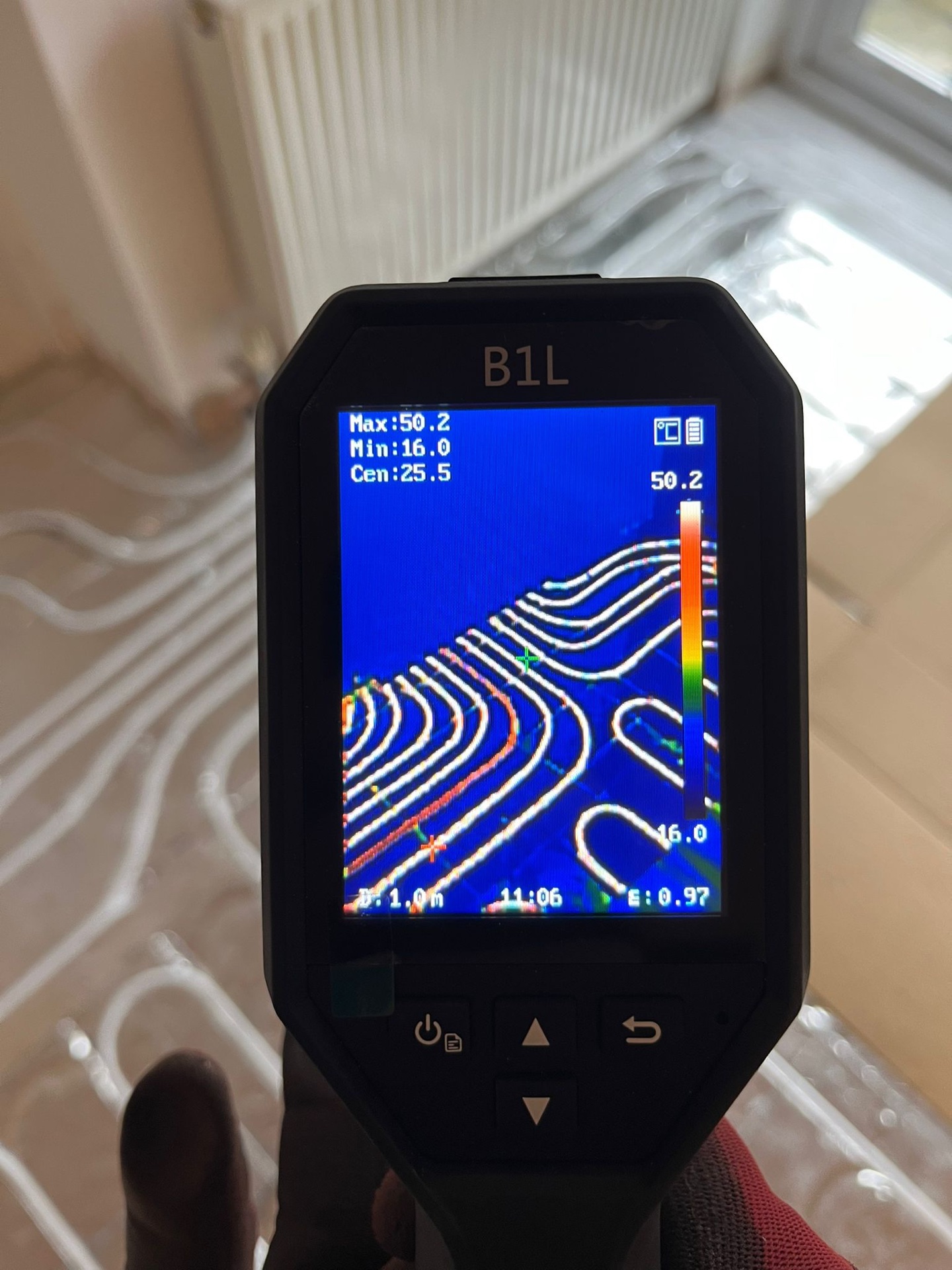 Thermal image of underfloor heating warming the floor