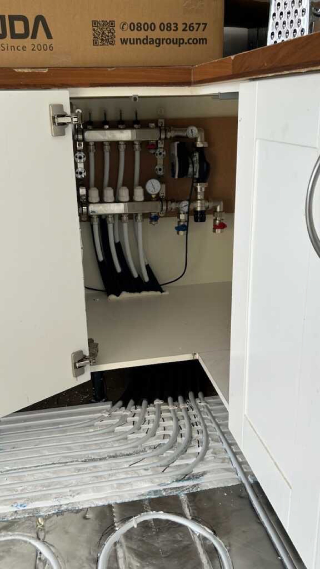 Underfloor heating manifold connected and balanced